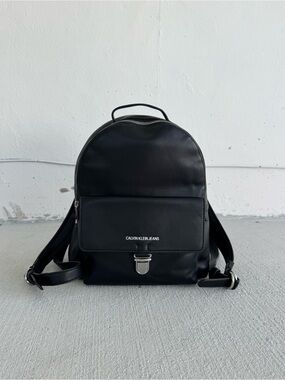 Calvin Klein Jeans Black Mini Leather Backpack with Front Pocket